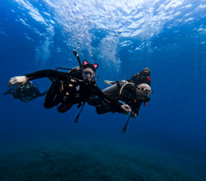 PADI open water Bali conservation coral restoration girls that scuba